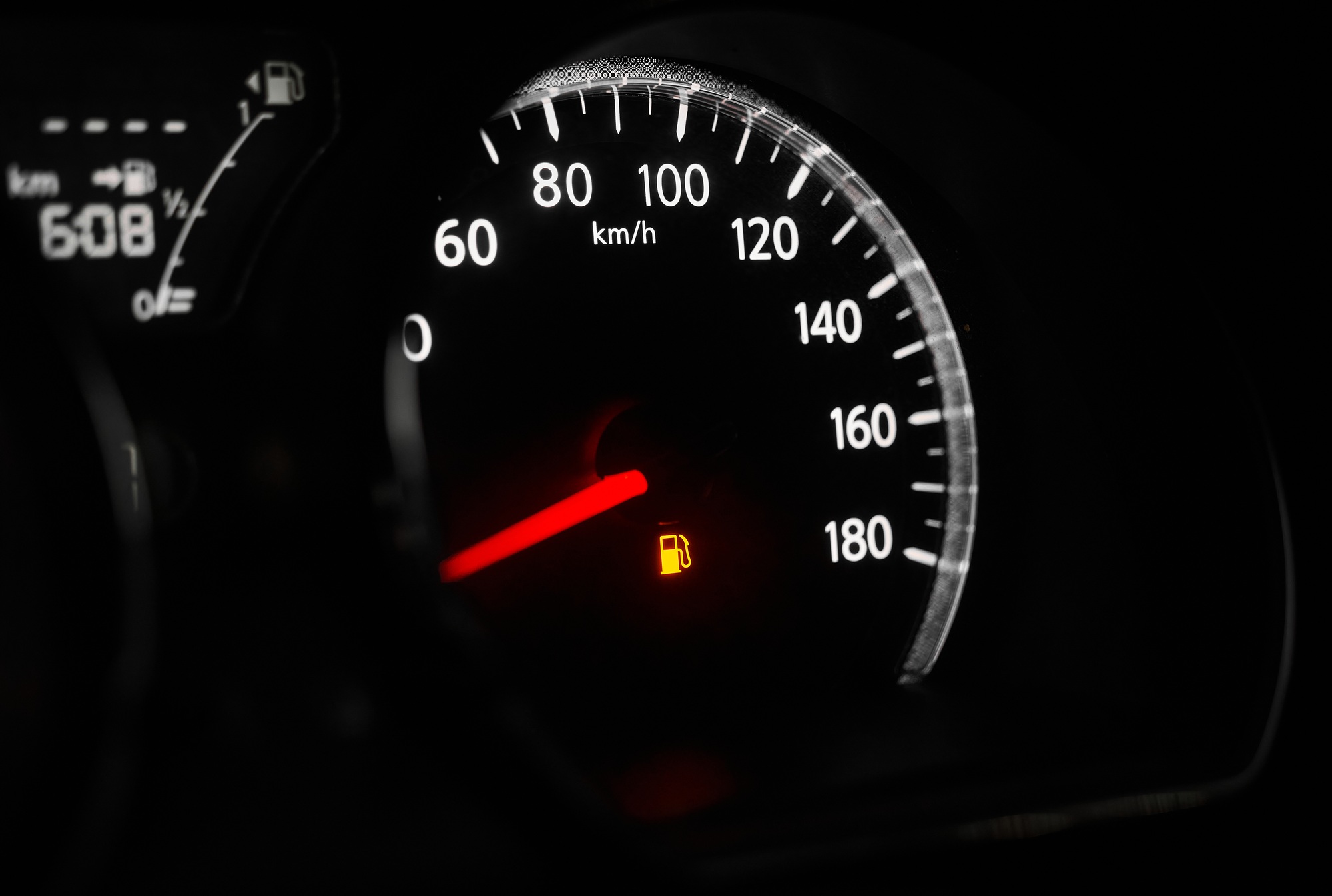 The car dashboard with a speedometer